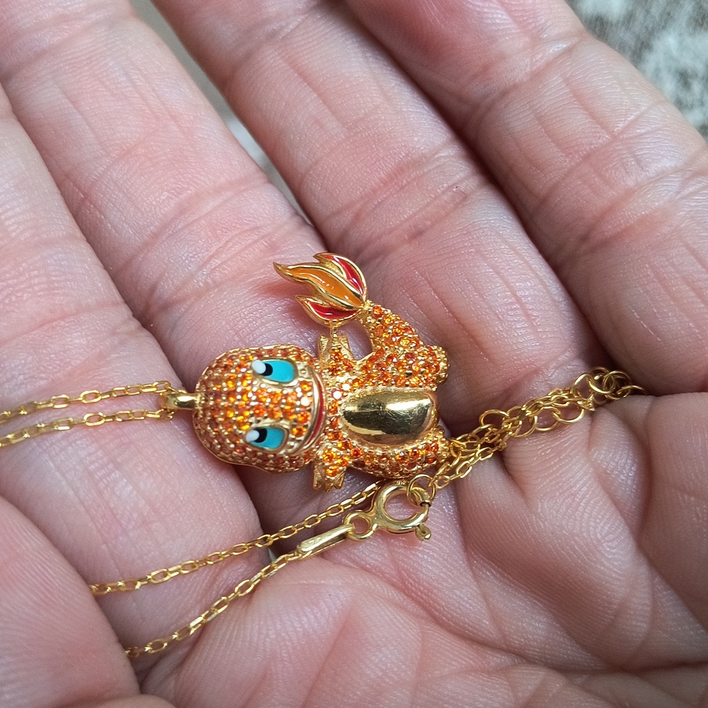 Gold plated .925 sterling silver Charmander Pokemon pendant necklace.